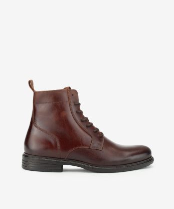 BOTA EM PELE DE ATACADOR COM SOLA DE RASTO